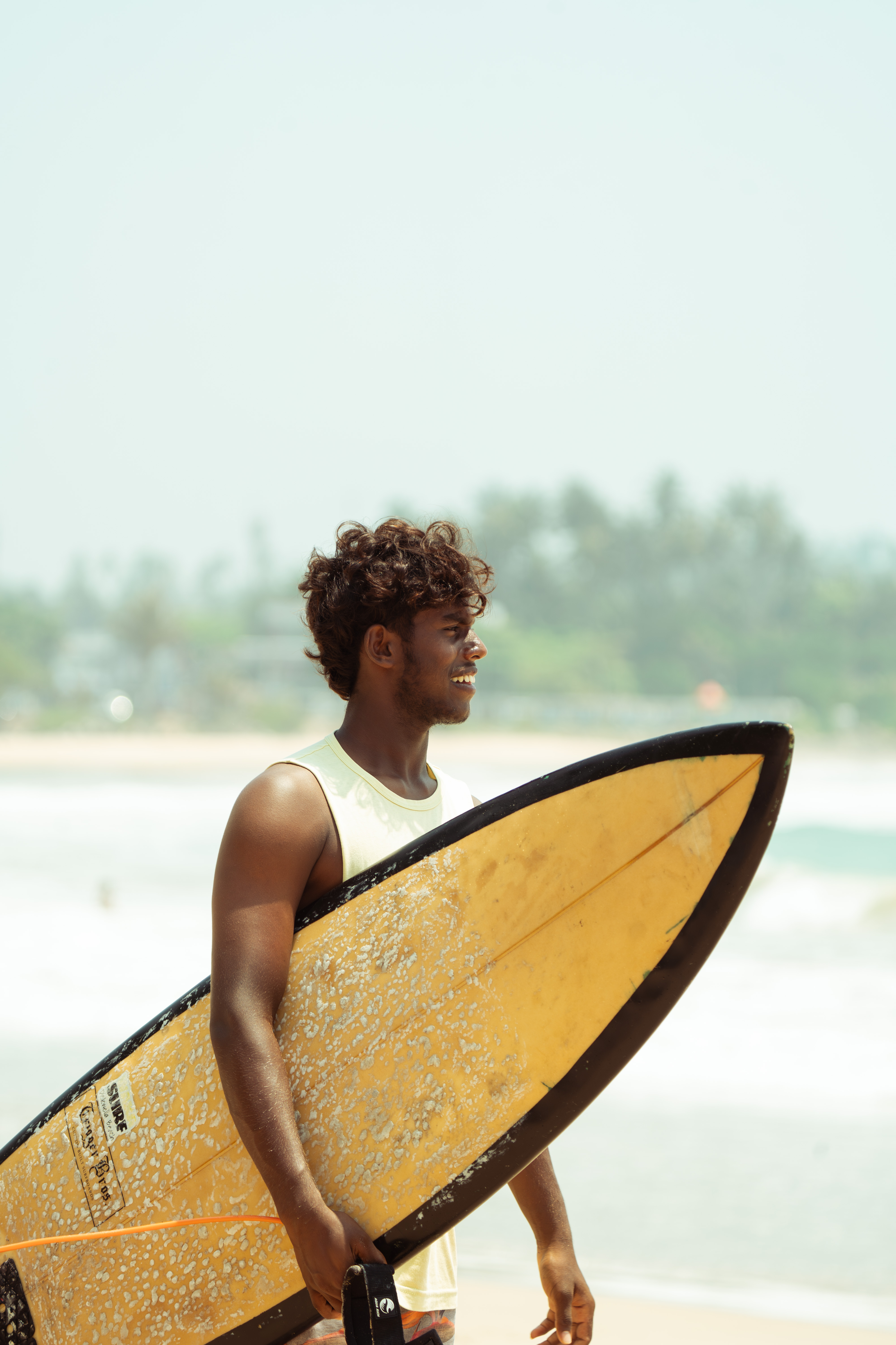 Surfing at Bathaegama Beach