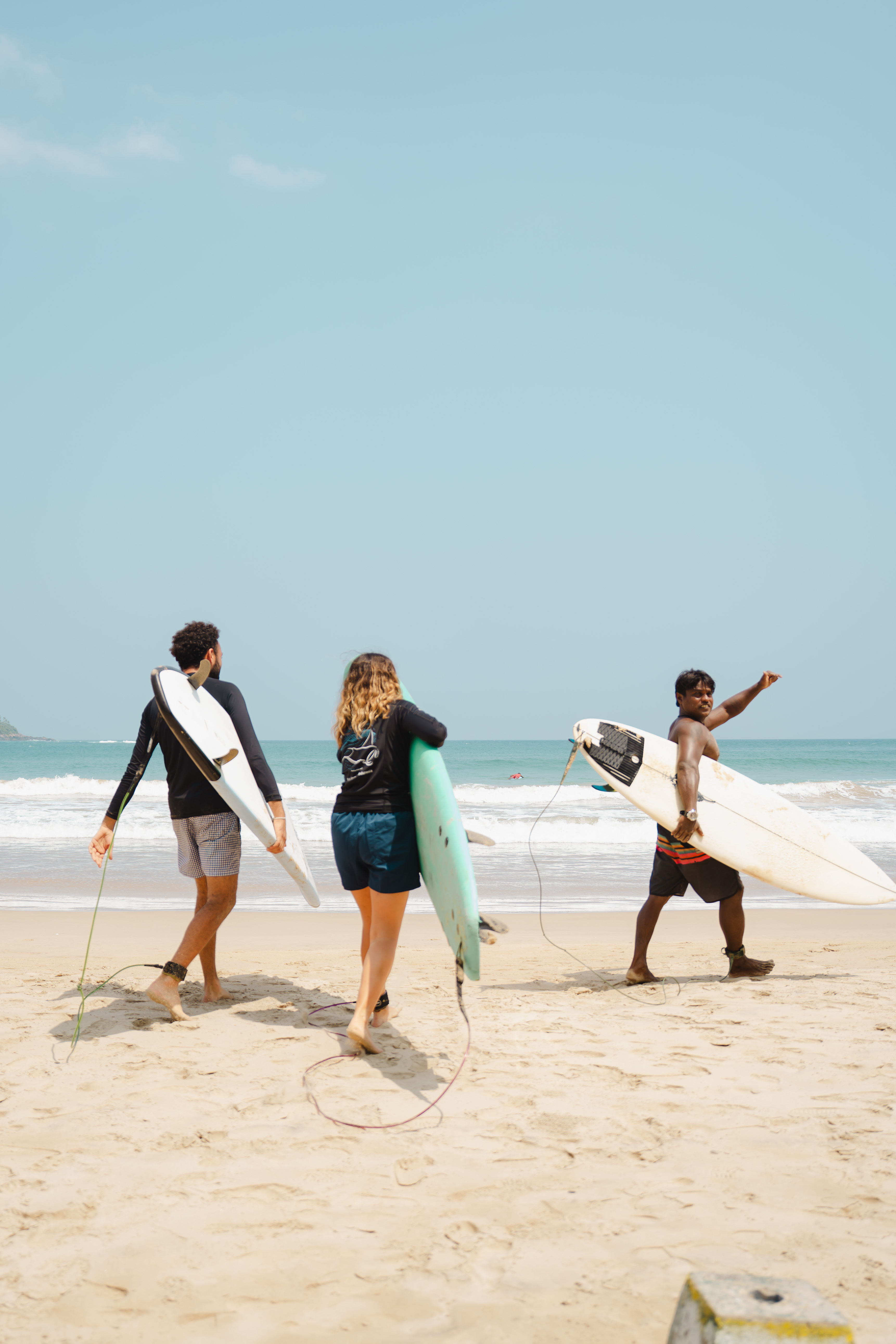 Surfing at Bathaegama Beach